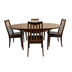 G-Plan - mid-20th century teak 'Fresco' extending dining table, circular top on tapered supports (W122cm H74cm); and Leslie Dandy for G-Plan - set six mid-20th century teak 'Fresco' dining chairs, high backs over tan leatherette seats (W46cm H91cm)