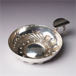French silver tasse de vin with Minerva's head and makers mark J.P. with an anchor, the rim engraved C Mouly, Spanish tasse de vin inset with a silver coin and two other tasse de vin (4)
