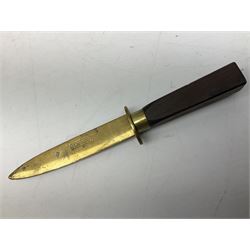 Malayan Kris dagger, the 31.5cm double edged straight heavy damascus blade with copper ferrule; carved hardwood grip; in large wooden throated scabbard with floral decorated white metal covering L47.5cm overall; a kris blade with adapted antler grip; and five various small daggers/letter openers (7)