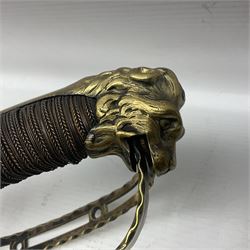 Late 18th century French 1st Empire Troupe a Pied Petit Montmorency Branch Tournante officer's sword, with 72.5cm slightly curving fullered blade, pierced brass hilt with lockable swivelling bar, fully wire-bound grip with lion head pommel, L88cm overall (no scabbard)