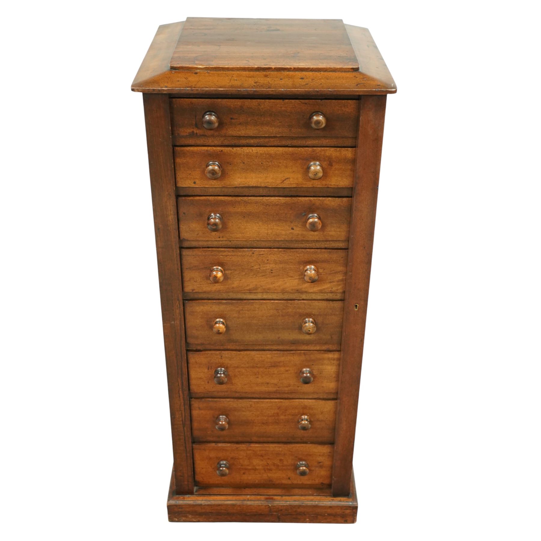 Victorian mahogany Wellington chest, the rectangular top above eight graduated drawers each fitted with turned knobs, flanked by hinged locking stiles, raised on a plinth base