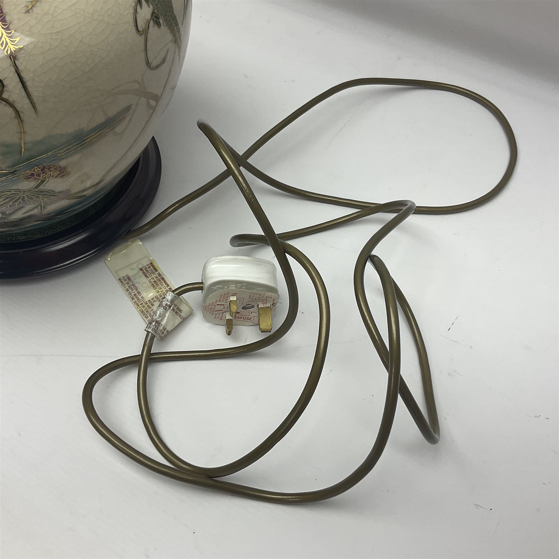 Table lamp of squat baluster form, decorated with Mandarin ducks and floral  landscape, upon a circular wooden base H42cm