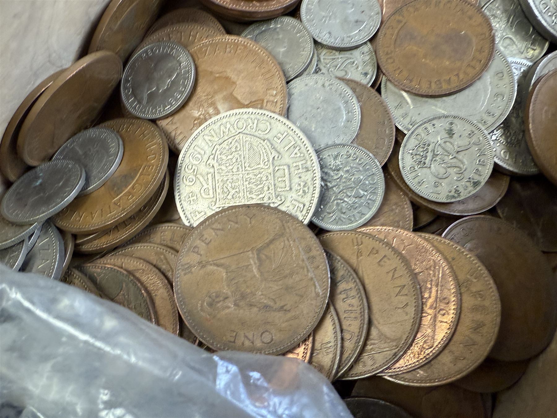 Approximately 115 grams of Great British pre-1947 silver coins, and further pre-decimal coins, housed in a miniature carved camphor wood chest