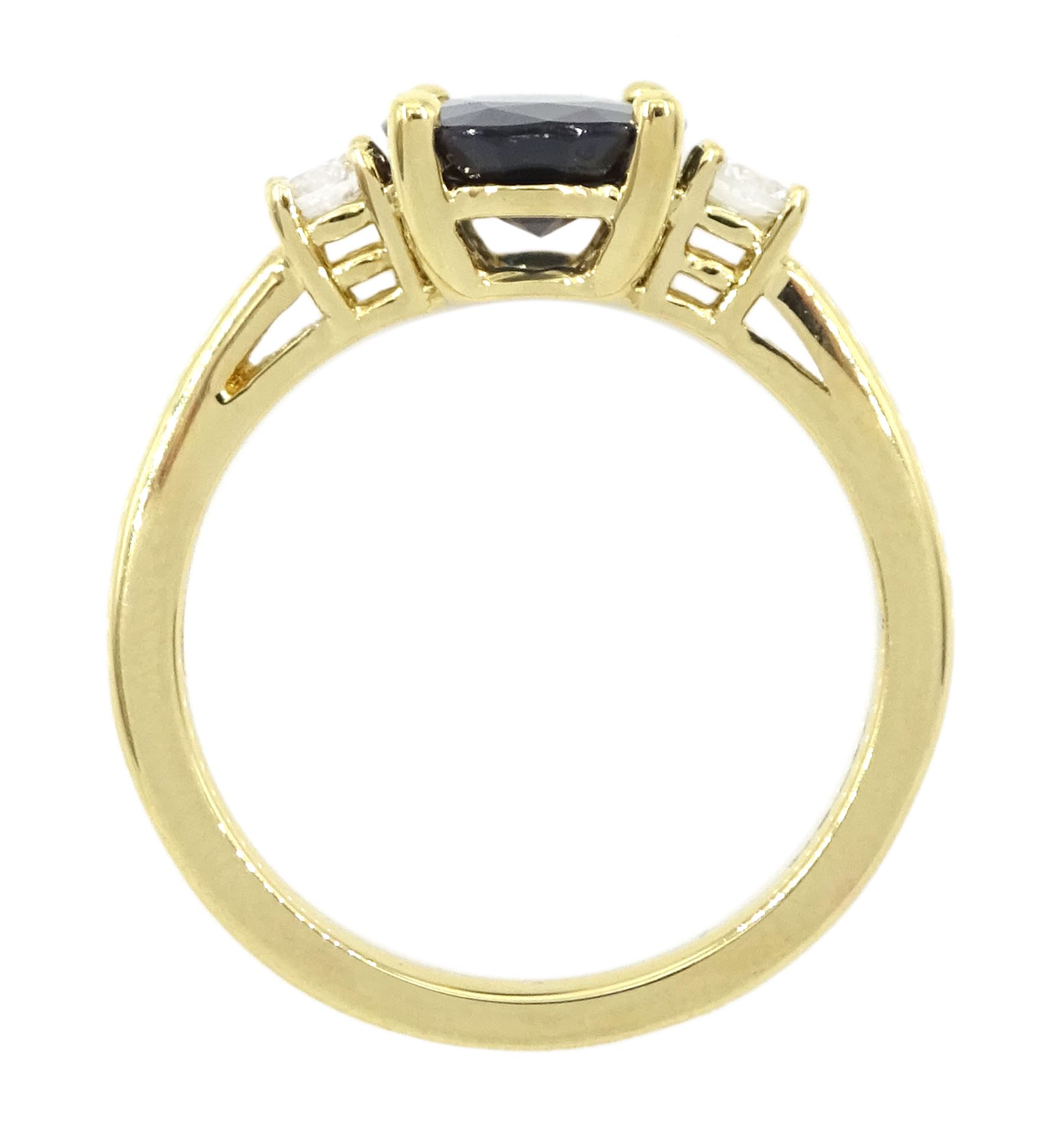 18ct gold sapphire and diamond three stone ring, single oval sapphire of approx 2.20 carat, with a single round brilliant cut diamond set either side, hallmarked, total diamond weight approx 0.25 carat