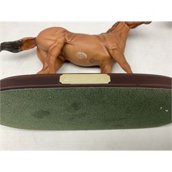 Collection of Beswick horse figures, to include Red Rum on a wooden plinth,  Lammtarra on oval plinth, Morgan Horse Black and three others, together with Royal Daulton Appaloosa Foal and a USSR horse