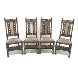 Set four Carolean style oak dining chairs, heavily carved and pierced cresting rail with floral detailing, cane work splat, upholstered seat, turned supports, carved stretcher, W50cm