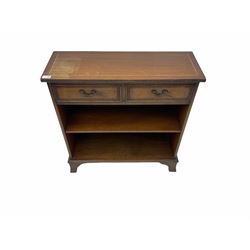 Small Georgian style mahogany open bookcase, fitted with two drawers 