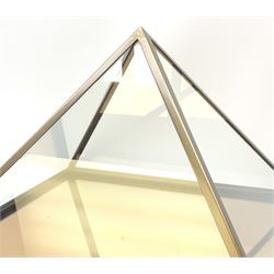 A large brass framed glass pyramid vitrine with gold tinted mirrored base, H37cm W58cm D58cm.