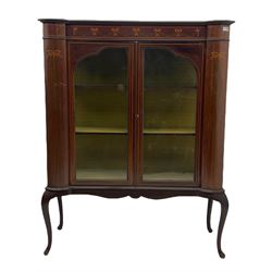 Edwardian mahogany display cabinet, shaped front with painted ribbon and bellflower garland decoration, enclosed by two glazed doors, cabriole supports