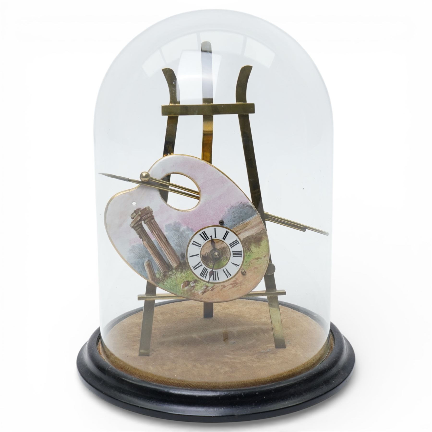 Late 19th century French novelty easel clock, the shaped panel in the form of an artist's palette painted with a landscape with classical columns on a gilt brass easel under a glass dome shade H33cm overall