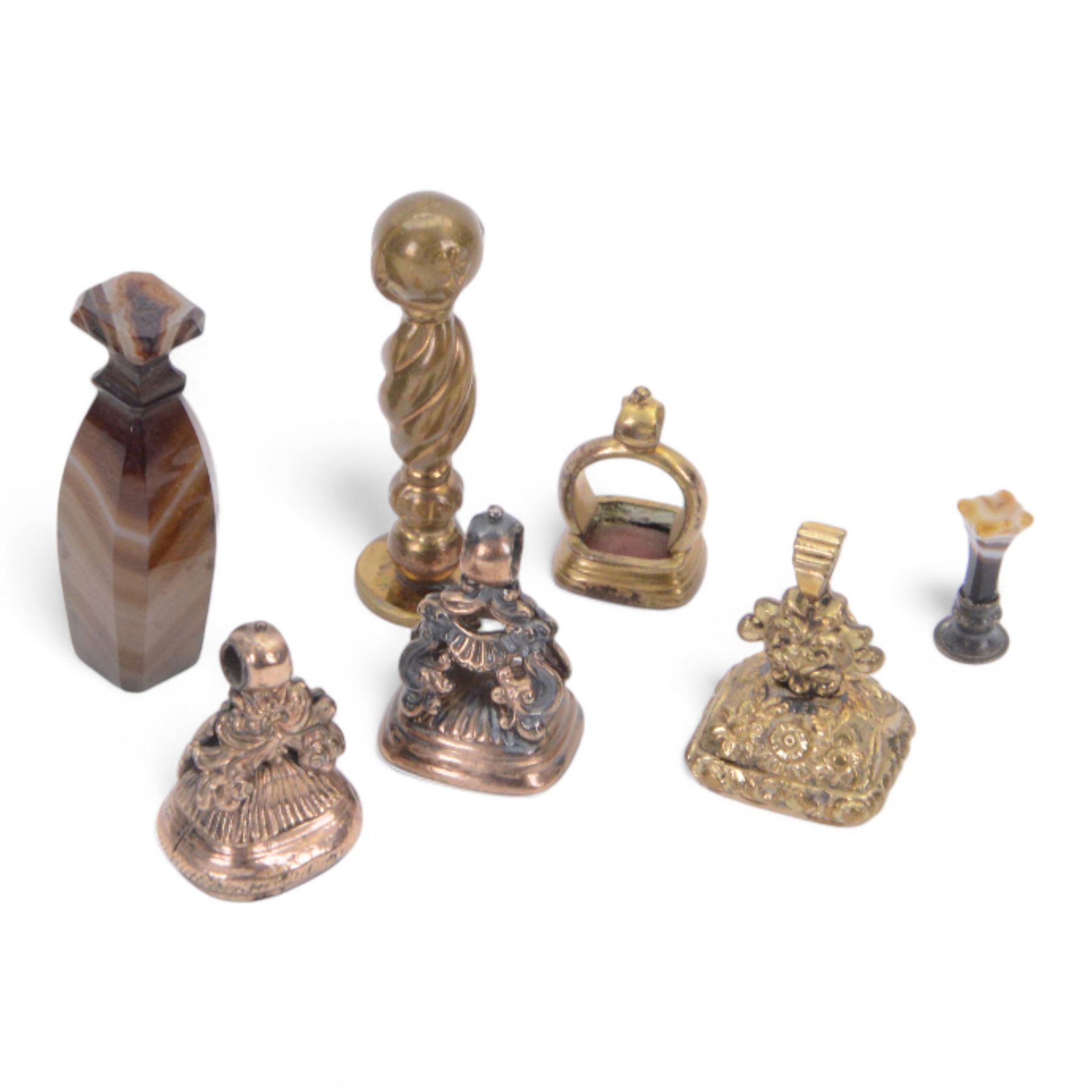 Collection of four 19th century gold plated seals with carnelian matrixes, together with three seals including an agate example, largest seal H3.5cm