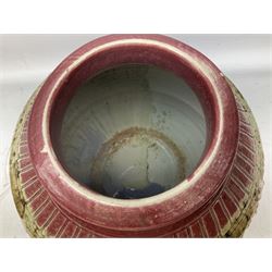Two stoneware jardinières, each decorated with lava type glazed in tines of grey and blue upon a pink ground, tallest example H30cm