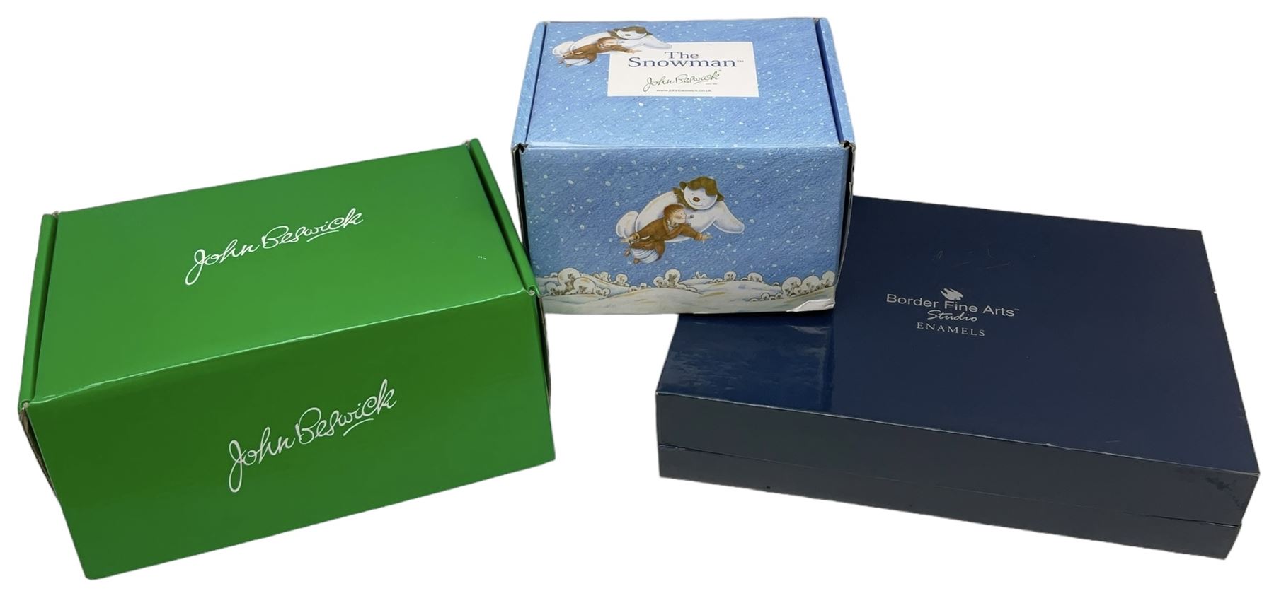 Two Beswick figures, composing The Snowman and Father Christmas, together with Border Fine Arts Enamel dish depicting a scene from The Snowman A3995, all in original boxes 