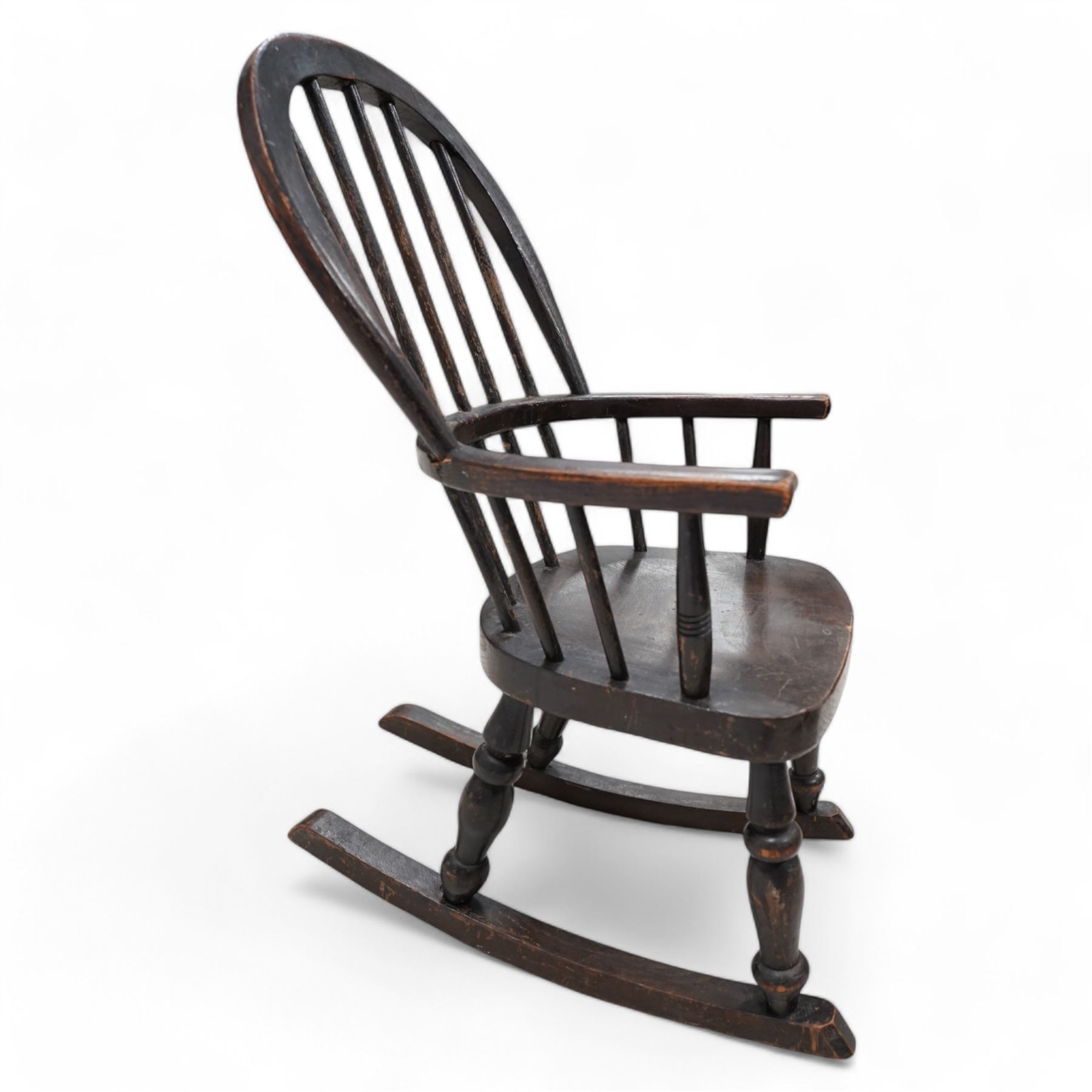 19th century child's Windsor rocking chair, double hoop and stick back, dish seat on turned supports united by rockers 
