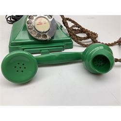Jade green Bakelite telephone, of pyramid form with alphabet dial, brown braided handset cord and a base draw