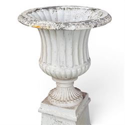 Victorian design white painted cast aluminium garden urn on plinth, fluted bowl on squat pedestal, tapering base