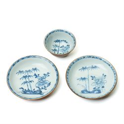 18th century Chinese Nanking cargo 'Batavian bamboo' pattern tea bowl and two saucers, ext...
