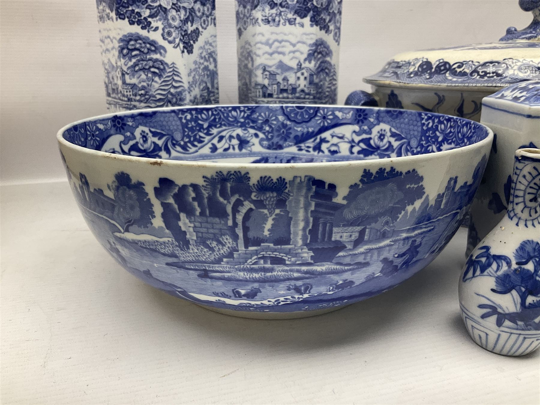 Large blue and white twin handled tureen with cover, Copeland Spode bowl, oriental blue and white jar and cover and a pair of blue and white vases