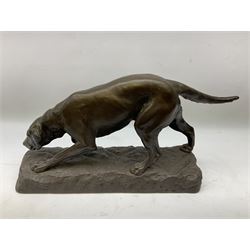 After Georges Gardet 1863-1939: A bronze effect study of a dog hunting, signed Georges Gardet, H29cm, L54cm
