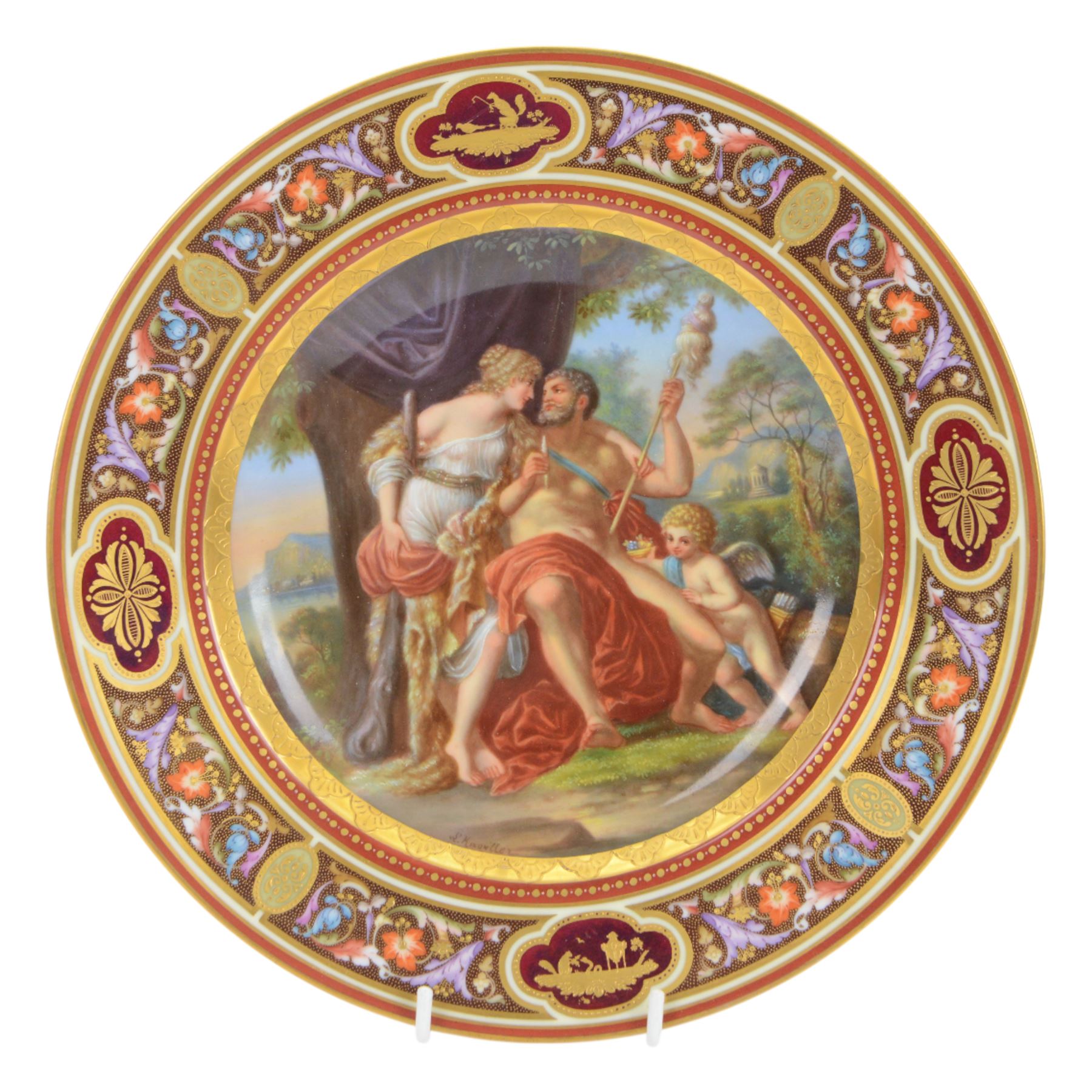 Royal Vienna plate, featuring Hercules and Omphale, the rim decorated with floral and gilt motifs, blue beehive mark beneath, D25cm