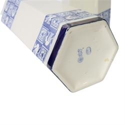 Pair of 1920's Art Deco Royal Doulton lustreware hexagonal vases, with boards of checkerboard design of alternating bird and scroll motifs, designed by Reco Capey, H28cm