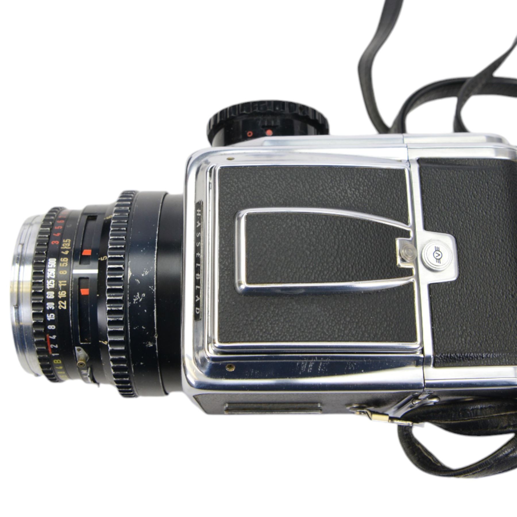 Hasselblad 500C/M medium format camera body, in chrome and black finish, serial no. UH129822, made in Sweden circa 1972, with Carl Zeiss planar 1:3.5 f=100mm lens, serial no. 5195173, wide angle lens hood, two film backs