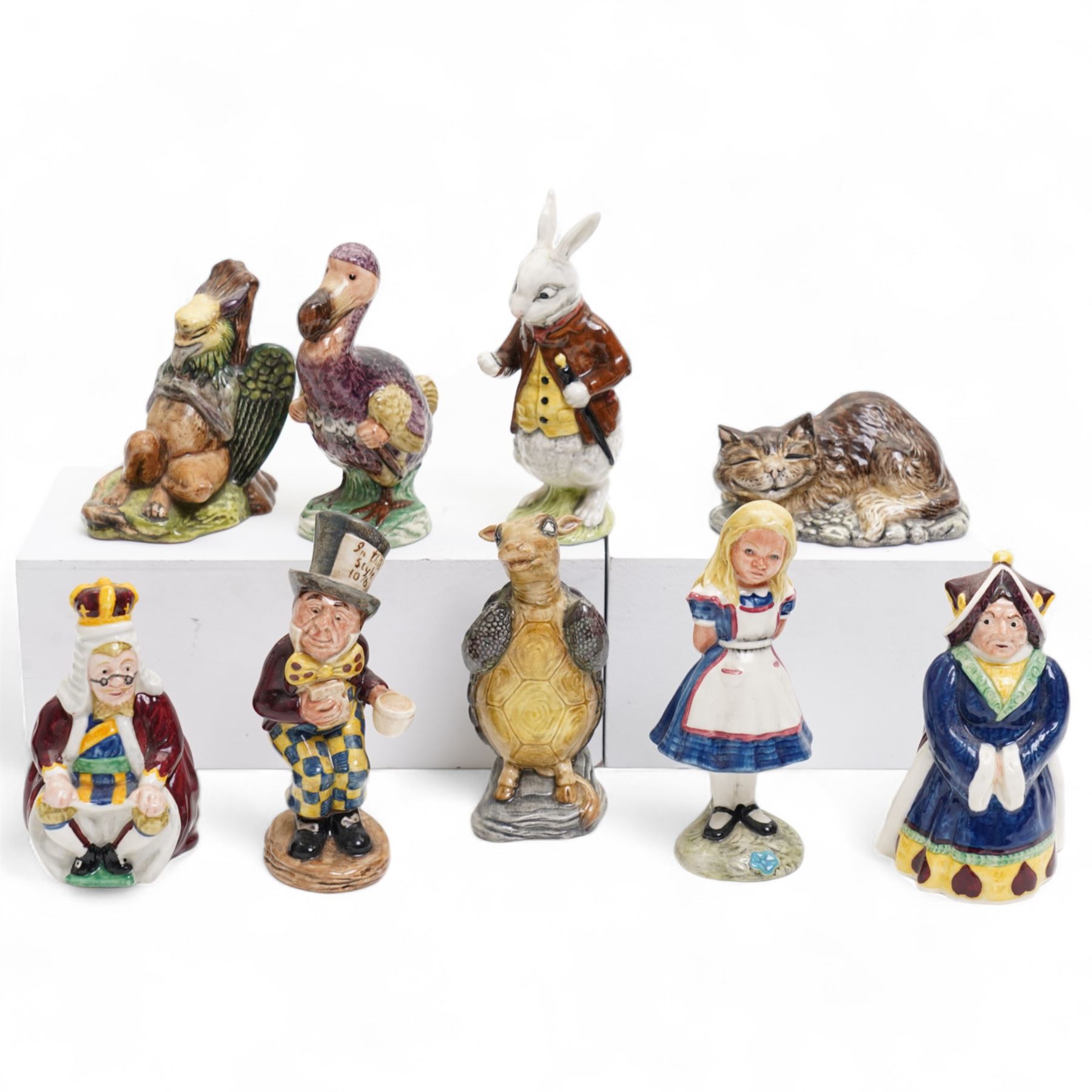 Nine Beswick Alice in Wonderland, including Alice, Queen of Hearts, King of Hearts, Gryphon, Dodo, Mock Turtle etc  