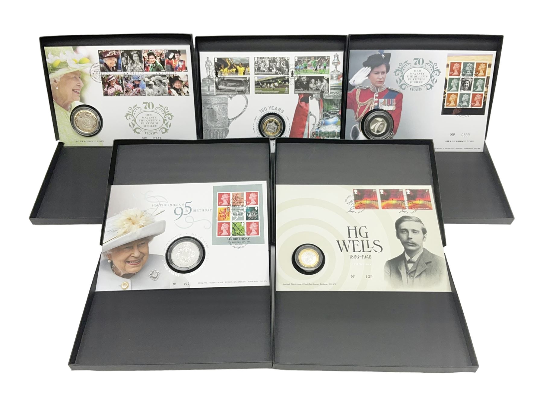 Five The Royal Mint Royal Mail silver proof coin covers, comprising 2021 'HG Wells' with two pounds, 2021 'HM The Queen's 95th Birthday' with five pounds, 2022 'Her Majesty The Queen's Platinum Jubilee 70 Years' with five pounds, 2022 'Her Majesty The Queen's Platinum Jubilee 70 Years' with fifty pence and 2022 '150 Years of The FA Cup' with two pounds, all in Royal Mail card boxes