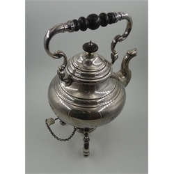  Edwardian silver tea kettle with spirit burning stand, swing handle with ebonised wooden grip and finial, scrolled supports with bun feet by Reid & Sons, London 1909, H27cm, 41oz gross  