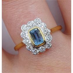 18ct gold emerald cut aquamarine and round brilliant cut diamond cluster ring, hallmarked, aquamarine approx 0..60 carat, total diamond weight approx 0.30 carat
