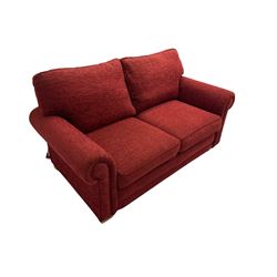 Two seat metal actions sofa bed upholstered in red cover