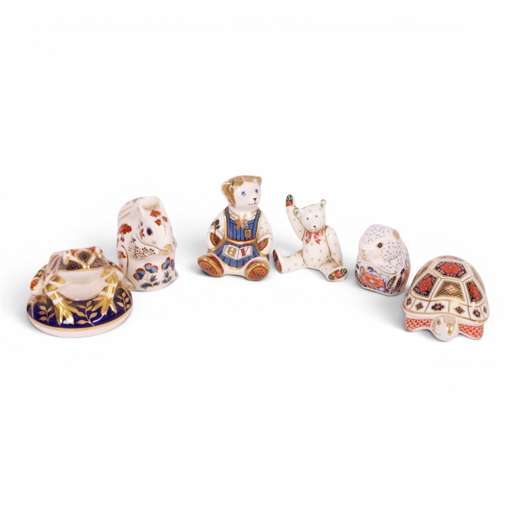 Six Royal Crown Derby paperweights, including Schoolgirl Teddy gold stopper, Poppy Mouse gold stopper, Squirrel gold stopper, etc  