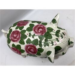 Large ceramic figure of a pig decorated with roses, L45cm