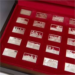 Elizabeth Our Queen silver ingots collection, twenty-five rectangular ingots each decorated in relief with a Royal scene, hallmarked John Pinches Ltd, London 1976, in wooden presentation case with information booklet