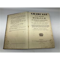 Six 19th century leather bound books of music comprising Graduale Juxta Missale Romanum and Antiphonarium Romanum. Both 1828 Divione; Graduel Romain and Psautier Romain. Both 1859 Digne/Paris; Graduel Romain. 1872 Marseille; and Missale Romanum. 1853 Mechliniae (6)