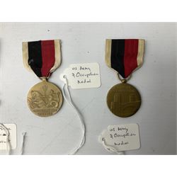 Nine American medals including WW2 Navy and Army Occupation medals, 1939-41 Defence Medal, boxed National Defence Medal and bar, South West Asia Service with bar, Air Force, National Guard and Military achievement medals etc (9)