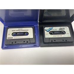 Sinclair ZX Spectrum (1984) with accessories and games; ten games for Sinclair Spectrum and 48K Spectrum to include ‘Knight Lore’, ‘The Way of the Exploding Fist’, and ‘Green Beret’ all in original boxes, ‘Rambo First Blood Part II’ without original box; Sinclair UK1400 Power Supply Unit, Hales Universal Mains Adapter, RAM Turbo Spectrum Joystick Interface, Starlite Cassette Player, all without boxes