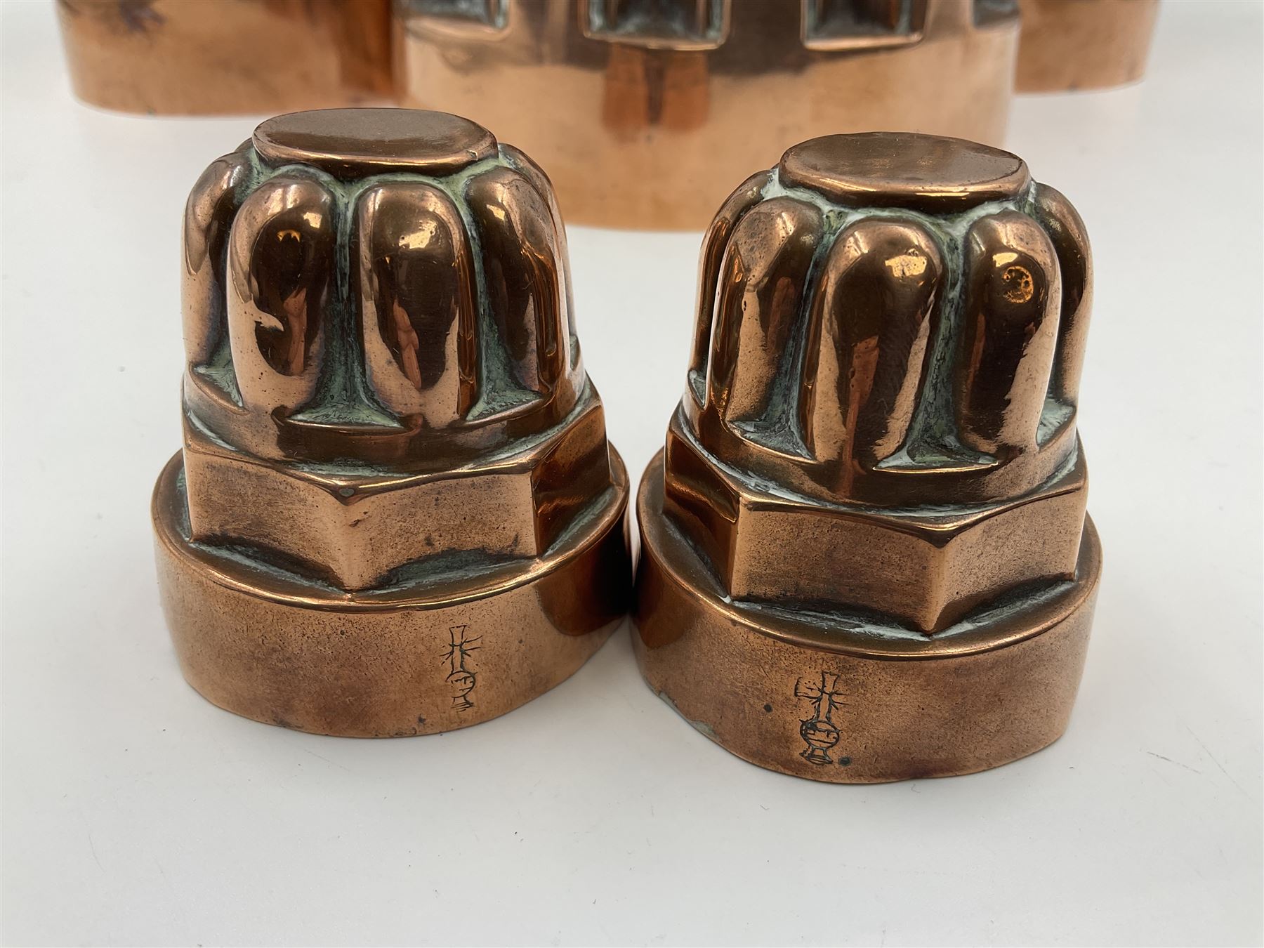 Five Victorian copper jelly mould, largest H10cm, L16cm