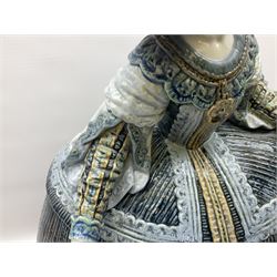 Large Lladro figure, La Menina, modelled as a maid of honor in service, on a mahogany oval base, limited edition 99/1000, sculpted by Jose Puche, with certificate of authenticity, framed and glazed, no 1812, year issued 1996, year retired 2019, H60cm