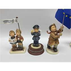 Thirty Hummel figures by Goebel, to include Saluting the Peacekeepers of Operation Joint Endeavor, on wooden plinth, Call to Glory, Celebrate with Song and Soldier Boy