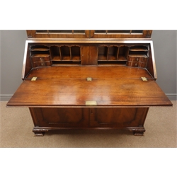  Georgian style mahogany bureau bookcase, projecting cornice, blind fret work frieze, astragal glazed doors enclosing three shelves above fall front with fitted interior, two drawers, two cupboards, acanthus carved bracket feet, W127cm, H183cm, D58cm  