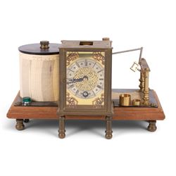 Brass barograph with integral brass clock, upon a wooden wooden plinth