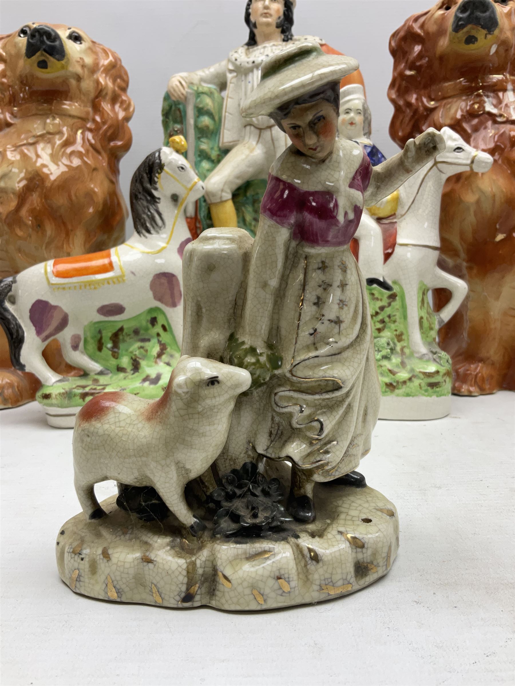 Group of Victorian and later Staffordshire style figures, to include two dogs, Prince upon horse back, horse with pink lustre patches, tall figure of a man beside his dog etc, tallest H41cm