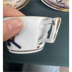 English porcelain Imari tea and coffee wares, pattern 1277, decorated with central orange floral motif surrounded by sprigs of yellow foliage within blue borders, comprising eleven teacups, eight coffee cups, twelve saucers, two shallow bowls and one finger bowl