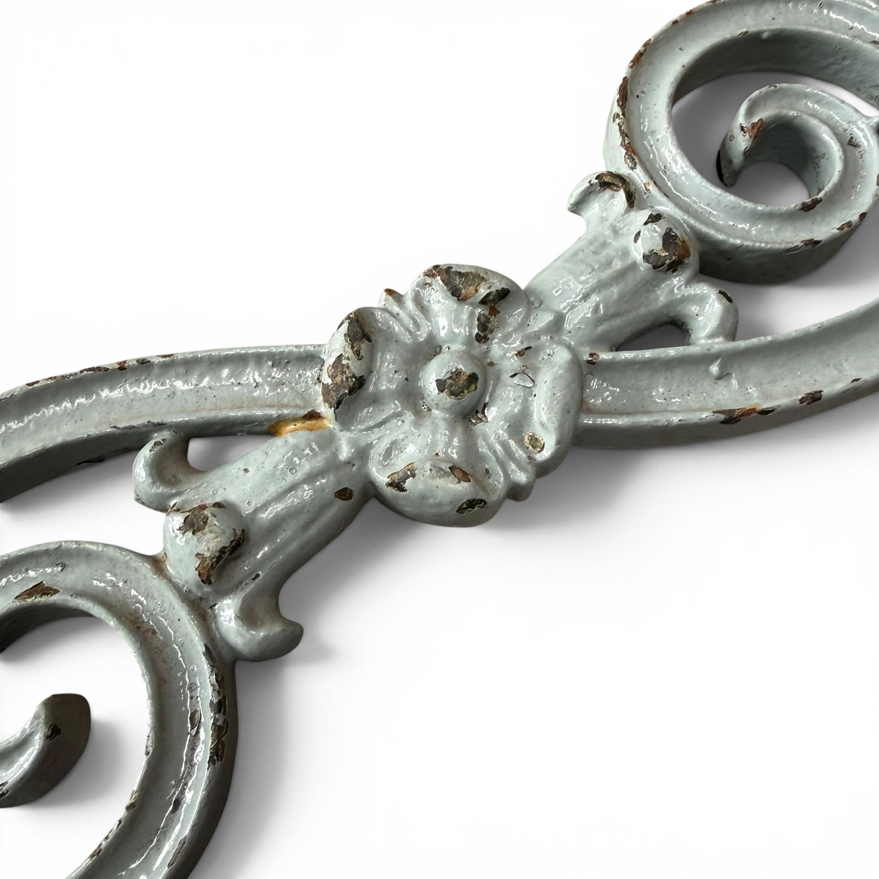Set of eleven 19th century cast iron ornate stair or banister spindle supports, of scrolling form with scalloped decoration and flower-head motifs, in weathered duck-egg blue painted finish (11)