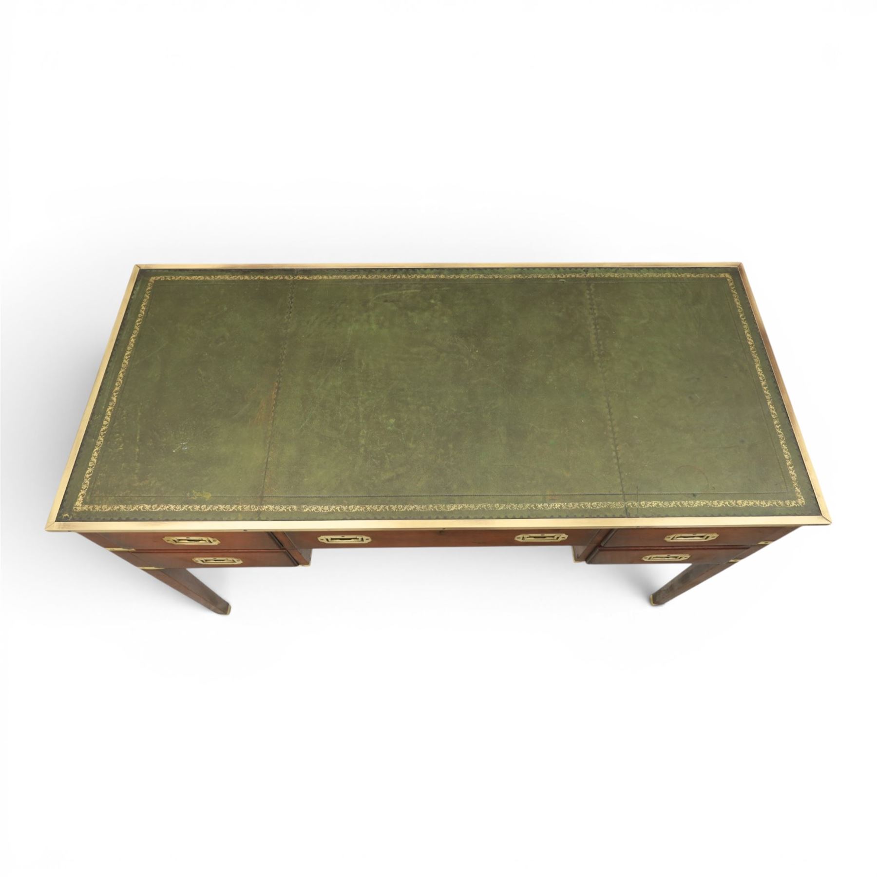 Military campaign style mahogany writing desk, inset gilt-tooled green leather writing surface, fitted with five drawers with recessed brass handles, brass corner mounts and protective bindings, on square tapering legs