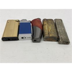 Collection of lighters, including Ronson Varaflame, Zorr Classic, Dunhill bark effect roller gas lighter, and faceted blue glass table lighter, etc