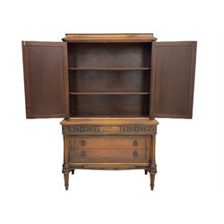 Early 20th century French walnut cabinet on chest, fitted with two segmented veneered cupboards above three drawers