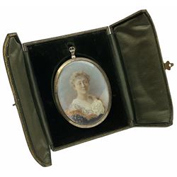 Portrait miniature of oval form H9cm, in a green Moroccan leather case with gilt edging, with a silk lining and velvet cushiob, together with a late 19th century miniature in a carved wooden frame, H20cm with frame. 