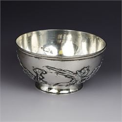 Early 20th century Chinese export silver bowl, of circular form, decorated in relief with ...